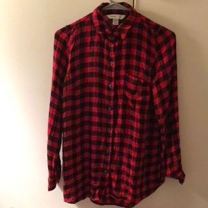 Black and red flannel, slightly longer in the back